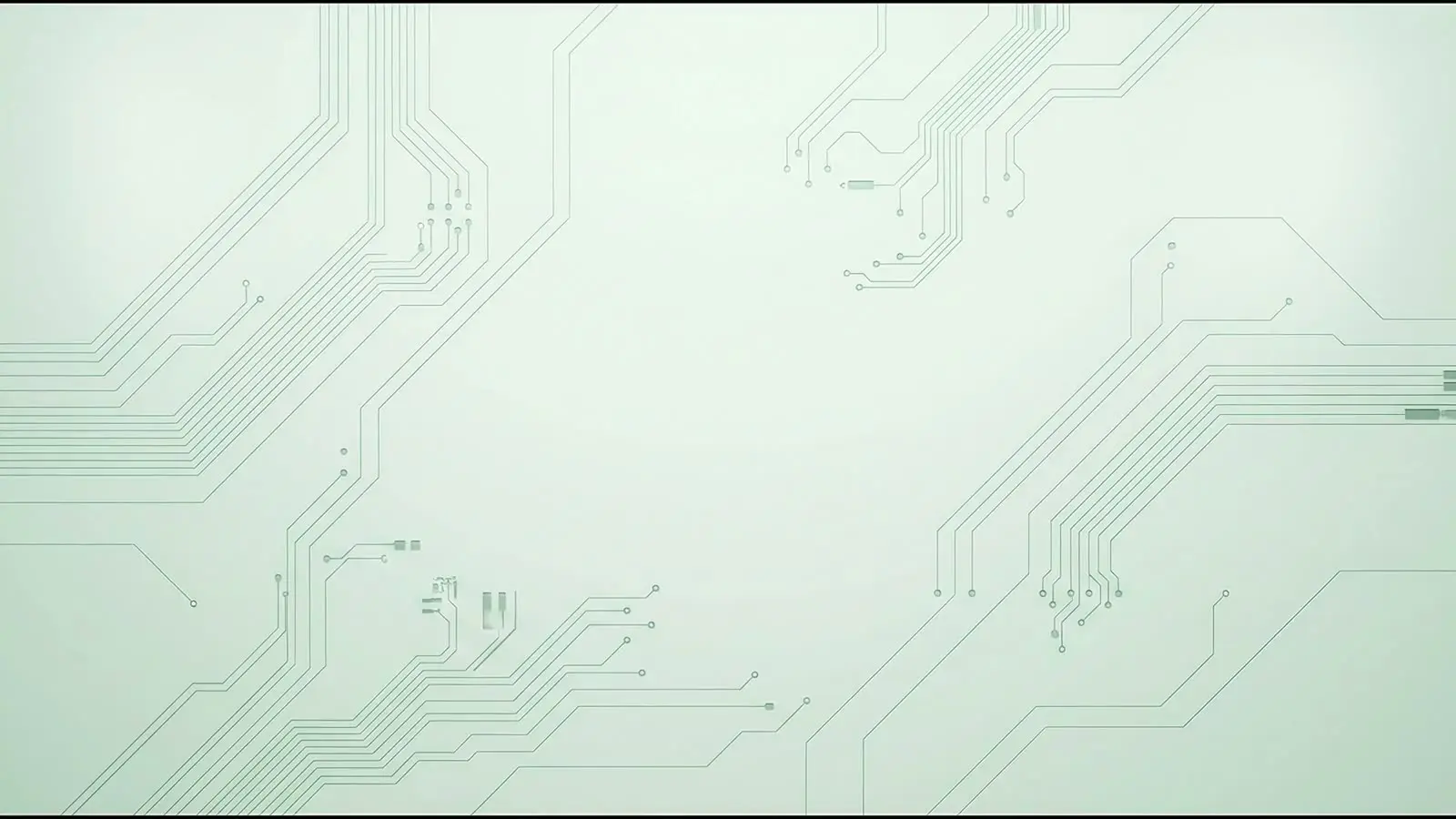 A macro view of pale green circuit-board traces filling the frame.