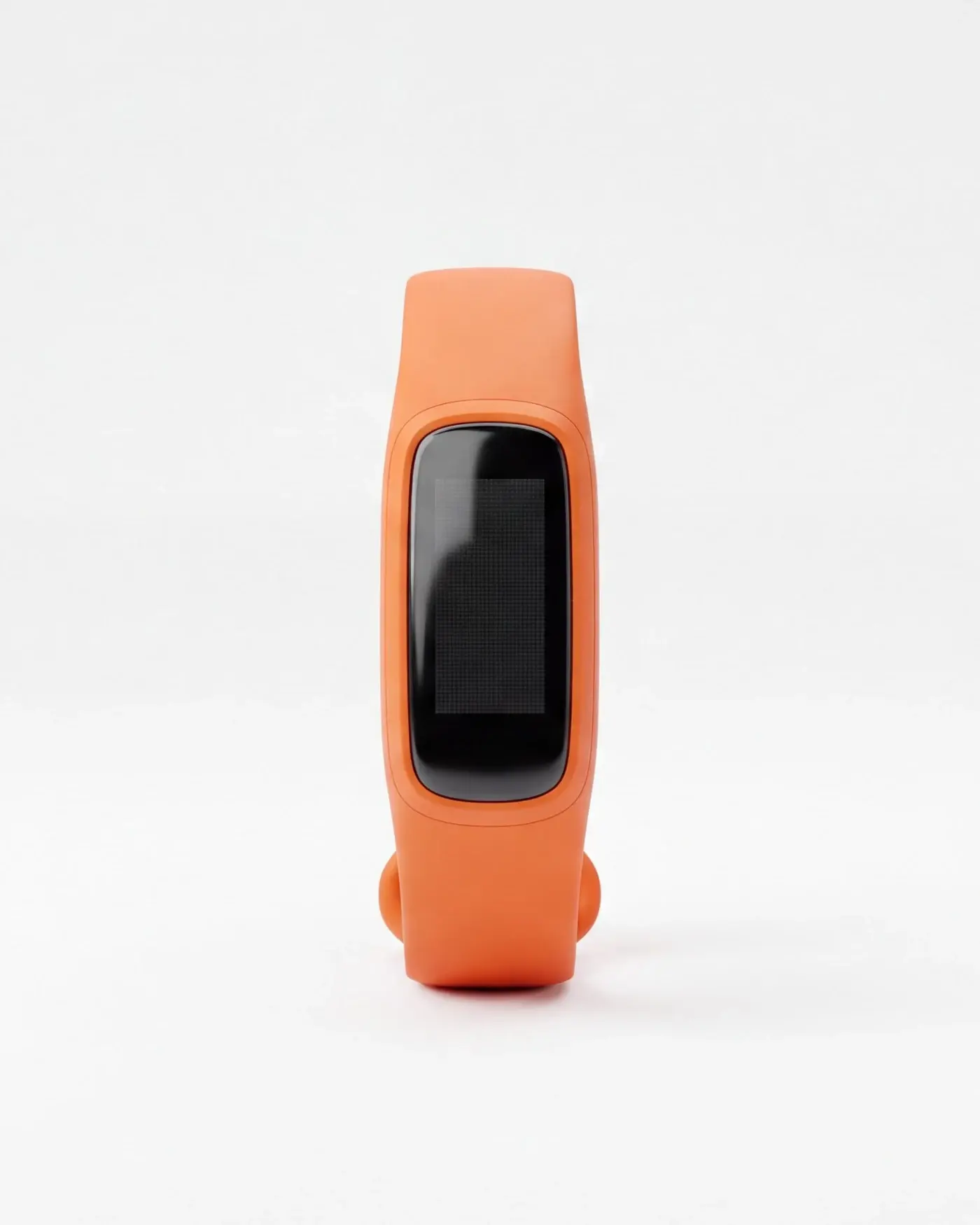 A rendered orange fitness band standing upright, its display dark.